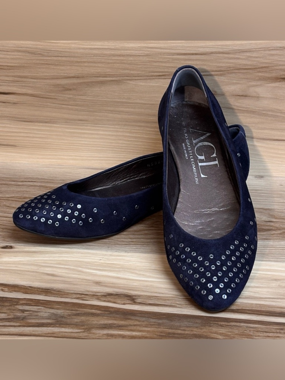 Attilio Giusti Leombruni Dark Blue suede flats featuring silver stud accents.